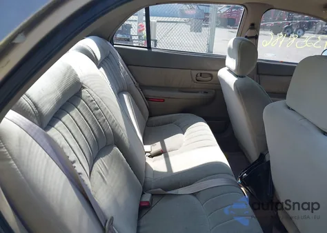 1998 Buick Century Custom z USA, uszkodzony, nr VIN 2G4WS52M3W1568687